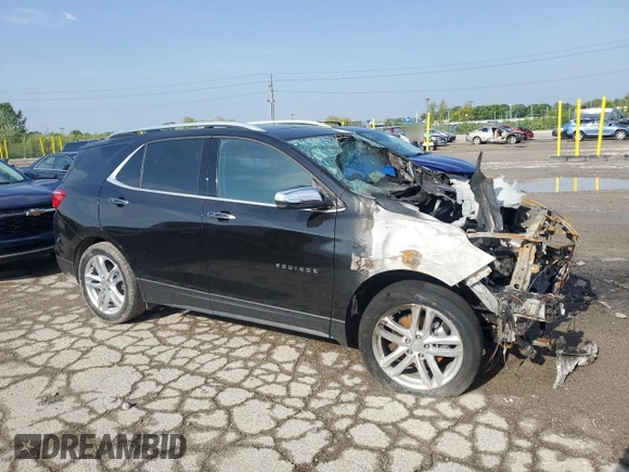 2019 Chevrolet Equinox Premier z VIN 3GNAXYEX9KL399167, wystawiony jako Copart lot #57021775 z przebiegiem Nie podano mil oraz Szkoda całkowita • Salvage title. Historia ofert i sprzedaży dostępna na DreamBid. Obrazek 4.