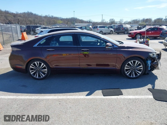 2019 Lincoln MKZ Reserve II z VIN 3LN6L5E99KR623668, wystawiony jako IAAI lot #41822730 z przebiegiem 13 609 mil mil oraz . Historia ofert i sprzedaży dostępna na DreamBid. Obrazek 13.