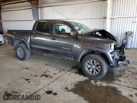 2018 Toyota Tacoma SR5 with VIN 3TMAZ5CN9JM075289, listed as a Copart auction lot 52409365 with 65,793 mi miles and Salvage Title. Bid and sale history available at DreamBid. Image 4.