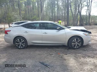 2016 Nissan Maxima SL with VIN 1N4AA6AP9GC406406, listed as a IAAI auction lot 41954790 with 139,380 mi miles and . Bid and sale history available at DreamBid. Image 13.