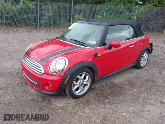 2011 MINI Convertible with VIN WMWZN3C59BTZ89447, listed as a IAAI auction lot 42313009 with 62,009 mi miles and . Bid and sale history available at DreamBid. Image 2.