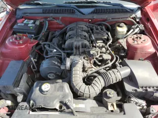 2005 Ford Mustang Deluxe z VIN 1ZVFT84N655177326, wystawiony jako Copart lot #59206775 z przebiegiem 134 187 mil mil oraz Szkoda całkowita • Salvage title. Historia ofert i sprzedaży dostępna na DreamBid. Obrazek 11.