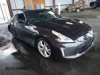 2016 Nissan 370Z with VIN JN1AZ4EHXGM935516, listed as a IAAI auction lot 41966014 with 92,147 mi miles. Bid and sale history available at carsss.com. Image 1.