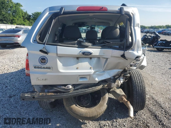 2010 Ford Escape XLS with VIN 1FMCU0C73AKA52802, listed as a Copart auction lot 60100185 with 141,541 mi miles and Clean title. Bid and sale history available at DreamBid. Image 6.