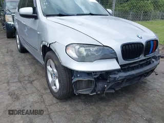2011 BMW X5 50i with VIN 5UXZV8C55BL419654, listed as a IAAI auction lot 42752609 with 204,677 mi miles and . Bid and sale history available at DreamBid. Image 12.
