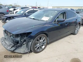 2016 Mazda 6 i Grand Touring with VIN JM1GJ1W59G1439075, listed as a IAAI auction lot 41792755 with 99,215 mi miles and . Bid and sale history available at DreamBid. Image 17.