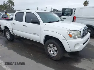 2009 Toyota Tacoma PreRunner z VIN 3TMJU62N29M072901, wystawiony jako IAAI lot #42254489 z przebiegiem 209 874 mil mil oraz . Historia ofert i sprzedaży dostępna na DreamBid. Obrazek 1.