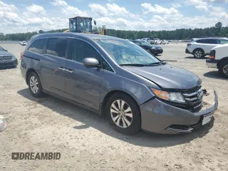 2014 Honda Odyssey EX-L with VIN 5FNRL5H62EB112280, listed as a Copart auction lot 60138645 with 167,657 mi miles and Salvage title. Bid and sale history available at DreamBid. Image 4.