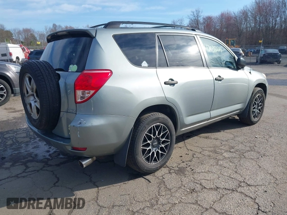 2007 Toyota RAV4 with VIN JTMBK33V976011985, listed as a IAAI auction lot 42035029 with 139,317 mi miles. Bid and sale history available at carsss.com. Image 4.