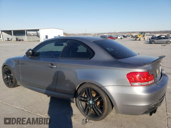 2012 BMW 1 Series 135i with VIN WBAUC9C5XCVM11673, listed as a Copart auction lot 88550445 with 119,456 mi miles and Salvage title. Bid and sale history available at DreamBid. Image 2.