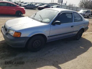1997 Toyota Tercel CE z VIN JT2AC52L7V0212023, wystawiony jako Copart lot #49150285 z przebiegiem 74 742 mil mil oraz Tytuł czysty. Historia ofert i sprzedaży dostępna na DreamBid. Obrazek 1.