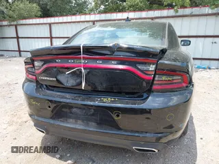 2023 Dodge Charger SXT z VIN 2C3CDXBG0PH564343, wystawiony jako IAAI lot #42351311 z przebiegiem 52 570 mil mil oraz . Historia ofert i sprzedaży dostępna na DreamBid. Obrazek 16.