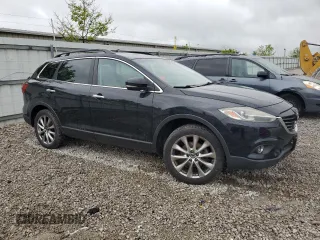 2014 Mazda CX-9 Grand Touring with VIN JM3TB3DA5E0432058, listed as a Copart auction lot 56766625 with 128,405 mi miles and Clean Title. Bid and sale history available at DreamBid. Image 4.