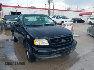 2003 Ford F-150 XL with VIN 1FTRF17233NB49481, listed as a IAAI auction lot 42562599 with 158,599 mi miles and . Bid and sale history available at DreamBid. Image 1.