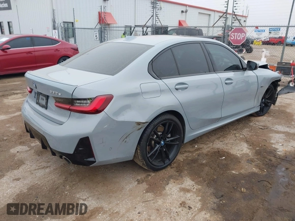 2023 BMW 3 Series 330e with VIN 3MW39FF00P8D57706, listed as a IAAI auction lot 41560259 with 1 mi miles. Bid and sale history available at carsss.com. Image 4.