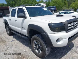 2009 Toyota Tacoma PreRunner with VIN 3TMJU62NX9M091048, listed as a IAAI auction lot 42272791 with 208,257 mi miles and . Bid and sale history available at DreamBid. Image 1.