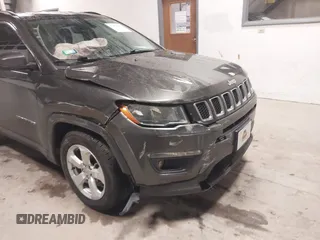 2020 Jeep Compass Latitude with VIN 3C4NJCBB8LT130425, listed as a IAAI auction lot 41475443 with 82,782 mi miles and . Bid and sale history available at carsss.com. Image 6.