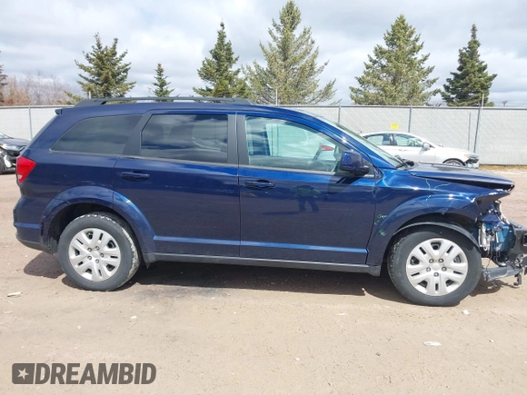 2019 Dodge Journey SE with VIN 3C4PDCBBXKT707700, listed as a IAAI auction lot 42038474 with 57,903 mi miles and . Bid and sale history available at DreamBid. Image 13.