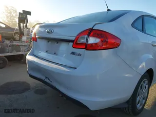2013 Ford Fiesta S with VIN 3FADP4AJXDM156194, listed as a IAAI auction lot 41870811 with 89,446 mi miles. Bid and sale history available at carsss.com. Image 6.