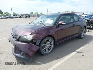 2013 Scion tC with VIN JTKJF5C7XD3064777, listed as a IAAI auction lot 42008710 with 147,808 mi miles. Bid and sale history available at carsss.com. Image 2.