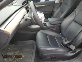 2023 Tesla Model 3 with VIN 5YJ3E1EA3PF451764, listed as a Copart auction lot 58718705 with 33,965 mi miles and Salvage title. Bid and sale history available at DreamBid. Image 7.