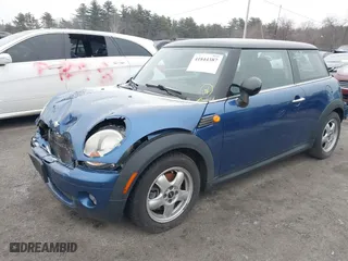 2009 MINI Cooper Hardtop with VIN WMWMF33579TW72543, listed as a IAAI auction lot 41844387 with 125,835 mi miles. Bid and sale history available at carsss.com. Image 2.