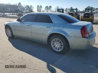 2005 Chrysler 300 with VIN 2C3JA43R95H168570, listed as a Copart auction lot 87672695 with 82,171 mi miles and Salvage Title. Bid and sale history available at carsss.com. Image 2.