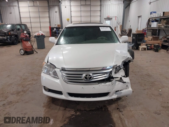2010 Toyota Avalon XL with VIN 4T1BK3DB9AU358803, listed as a IAAI auction lot 41072257 with 157,185 mi miles and . Bid and sale history available at DreamBid. Image 12.