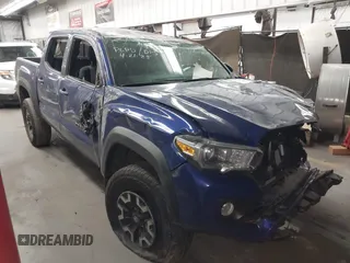 2022 Toyota Tacoma SR with VIN 3TYCZ5AN4NT093821, listed as a IAAI auction lot 42146730 with 26,531 mi miles and . Bid and sale history available at DreamBid. Image 1.