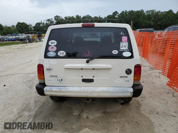 2001 Jeep Cherokee Sport with VIN 1J4FF48S31L520760, listed as a Copart auction lot 59807625 with 298,489 mi miles and Salvage title. Bid and sale history available at DreamBid. Image 6.
