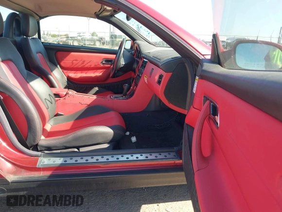 1999 Mercedes-Benz SLK 230/320 with VIN WDBKK47F5XF112125, listed as a IAAI auction lot 42207615 with 93,962 mi miles and . Bid and sale history available at DreamBid. Image 5.