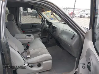 2003 Ford F-150 XL with VIN 1FTRX07W33KB50920, listed as a IAAI auction lot 41742906 with 100,560 mi miles and . Bid and sale history available at DreamBid. Image 5.