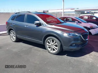 2013 Mazda CX-9 Grand Touring z VIN JM3TB3DA9D0413530, wystawiony jako IAAI lot #42817680 z przebiegiem 138 772 mil mil oraz . Historia ofert i sprzedaży dostępna na DreamBid. Obrazek 1.