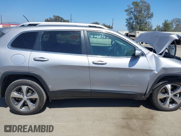 2021 Jeep Cherokee Limited with VIN 1C4PJLDX0MD100067, listed as a IAAI auction lot 42273029 with 84,579 mi miles and . Bid and sale history available at DreamBid. Image 14.