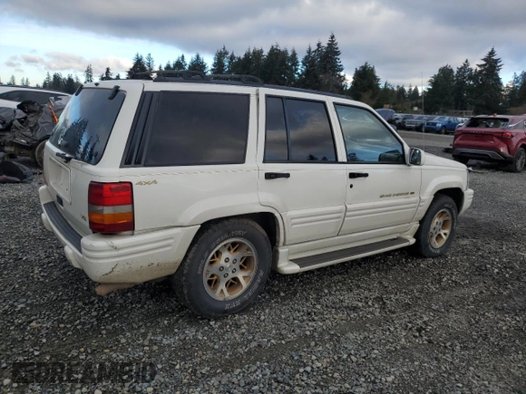 1997 Jeep Grand Cherokee Limited with VIN 1J4GZ78Y7VC772292, listed as a Copart auction lot 87692445 with 0 mi miles and Salvage Title. Bid and sale history available at carsss.com. Image 3.
