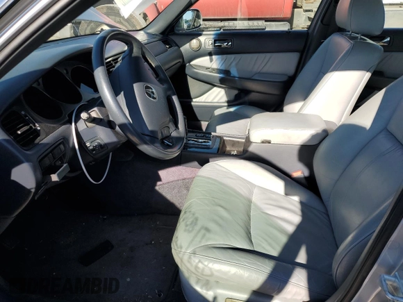 2004 Acura RL w/Navigation System with VIN JH4KA96664C006748, listed as a Copart auction lot 80480714 with 146,785 mi miles and Salvage Title. Bid and sale history available at carsss.com. Image 7.