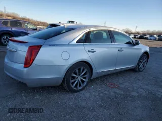 2014 Cadillac XTS with VIN 2G61L5S3XE9169958, listed as a Copart auction lot 42042145 with 100,359 mi miles and Clean Title. Bid and sale history available at carsss.com. Image 3.