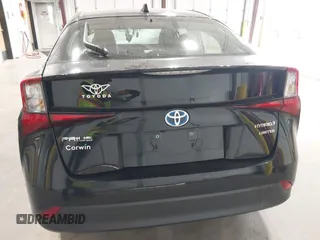 2022 Toyota Prius L Eco with VIN JTDKAMFU2N3186072, listed as a IAAI auction lot 42486252 with 5,887 mi miles and . Bid and sale history available at DreamBid. Image 16.