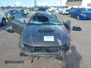 2004 Ford Mustang Standard z VIN 1FAFP40684F194867, wystawiony jako IAAI lot #39963442 z przebiegiem Nie podano mil oraz . Historia ofert i sprzedaży dostępna na DreamBid. Obrazek 12.
