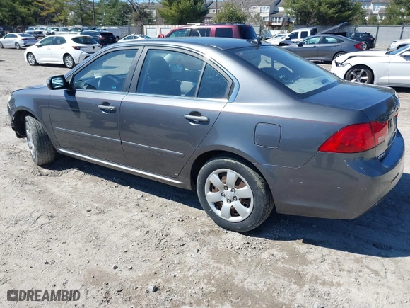 2009 Kia Optima LX with VIN KNAGE228195301338, listed as a IAAI auction lot 41904987 with 153,197 mi miles. Bid and sale history available at carsss.com. Image 3.