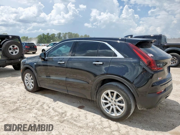 2023 Cadillac XT4 FWD Luxury with VIN 1GYAZAR46PF178003, listed as a Copart auction lot 59121545 with 42,000 mi miles and Salvage title. Bid and sale history available at DreamBid. Image 2.