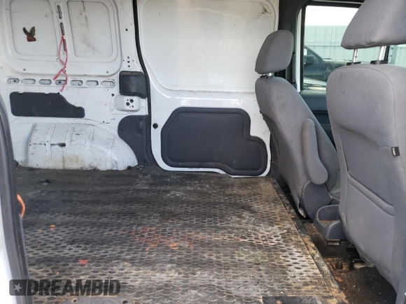 2010 Ford Transit Connect XL z VIN NM0LS7AN5AT010952, wystawiony jako Copart lot #70926704 z przebiegiem 183 978 mil mil oraz Czysty tytuł • Clean title. Historia ofert i sprzedaży dostępna na DreamBid. Obrazek 11.