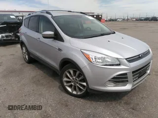 2016 Ford Escape SE with VIN 1FMCU9G91GUA29242, listed as a IAAI auction lot 42099898 with 125,330 mi miles. Bid and sale history available at carsss.com. Image 1.