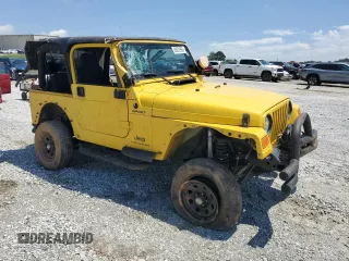 2004 Jeep Wrangler Sport with VIN 1J4FA49S84P753317, listed as a Copart auction lot 55872965 with 185,763 mi miles and Salvage title. Bid and sale history available at DreamBid. Image 4.