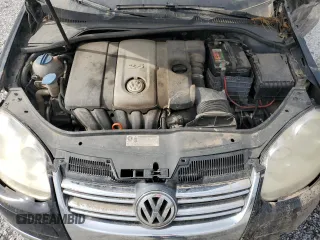 2009 Volkswagen Jetta S z VIN 3VWJM71K39M165677, wystawiony jako Copart lot #56901665 z przebiegiem 202 632 mil mil oraz Czysty tytuł • Clean title. Historia ofert i sprzedaży dostępna na DreamBid. Obrazek 11.