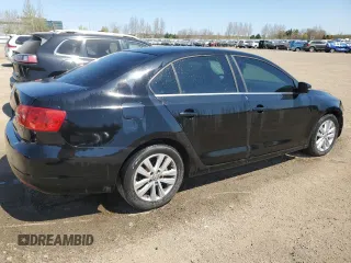 2014 Volkswagen Jetta with VIN 3VWWL7AJ2EM366464, listed as a Copart auction lot 56569795 with 139,761 mi miles and Clean title. Bid and sale history available at DreamBid. Image 3.