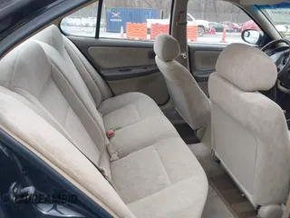 1999 Nissan Altima XE with VIN 1N4DL01DXXC148729, listed as a IAAI auction lot 41697641 with 187,596 mi miles. Bid and sale history available at carsss.com. Image 8.
