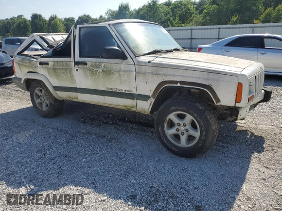1999 Jeep Cherokee Sport z VIN 1J4FF68S3XL597049, wystawiony jako Copart lot #58736325 z przebiegiem 134 684 mil mil oraz Nie do naprawy • Non repairable. Historia ofert i sprzedaży dostępna na DreamBid. Obrazek 4.