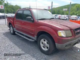 2001 Ford Explorer Sport Trac z VIN 1FMZU77E71UB98216, wystawiony jako IAAI lot #42296477 z przebiegiem 247 180 mil mil oraz . Historia ofert i sprzedaży dostępna na DreamBid. Obrazek 1.
