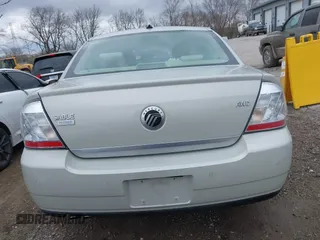 2008 Mercury Sable Premier z VIN 1MEHM43W58G601548, wystawiony jako IAAI lot #41843679 z przebiegiem 62 196 mil mil oraz . Historia ofert i sprzedaży dostępna na DreamBid. Obrazek 16.